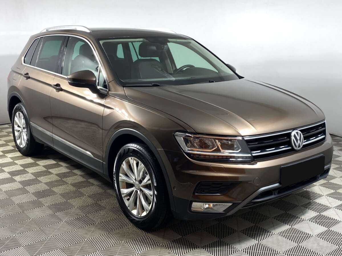 Купить Volkswagen Tiguan с пробегом. Фото: #2